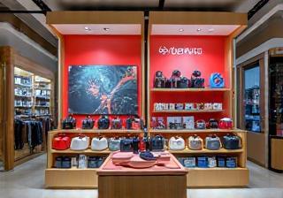 Display of premium headphones and speakers in a bright retail store